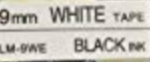 ليبل أبيض بخط أسود 9 مم